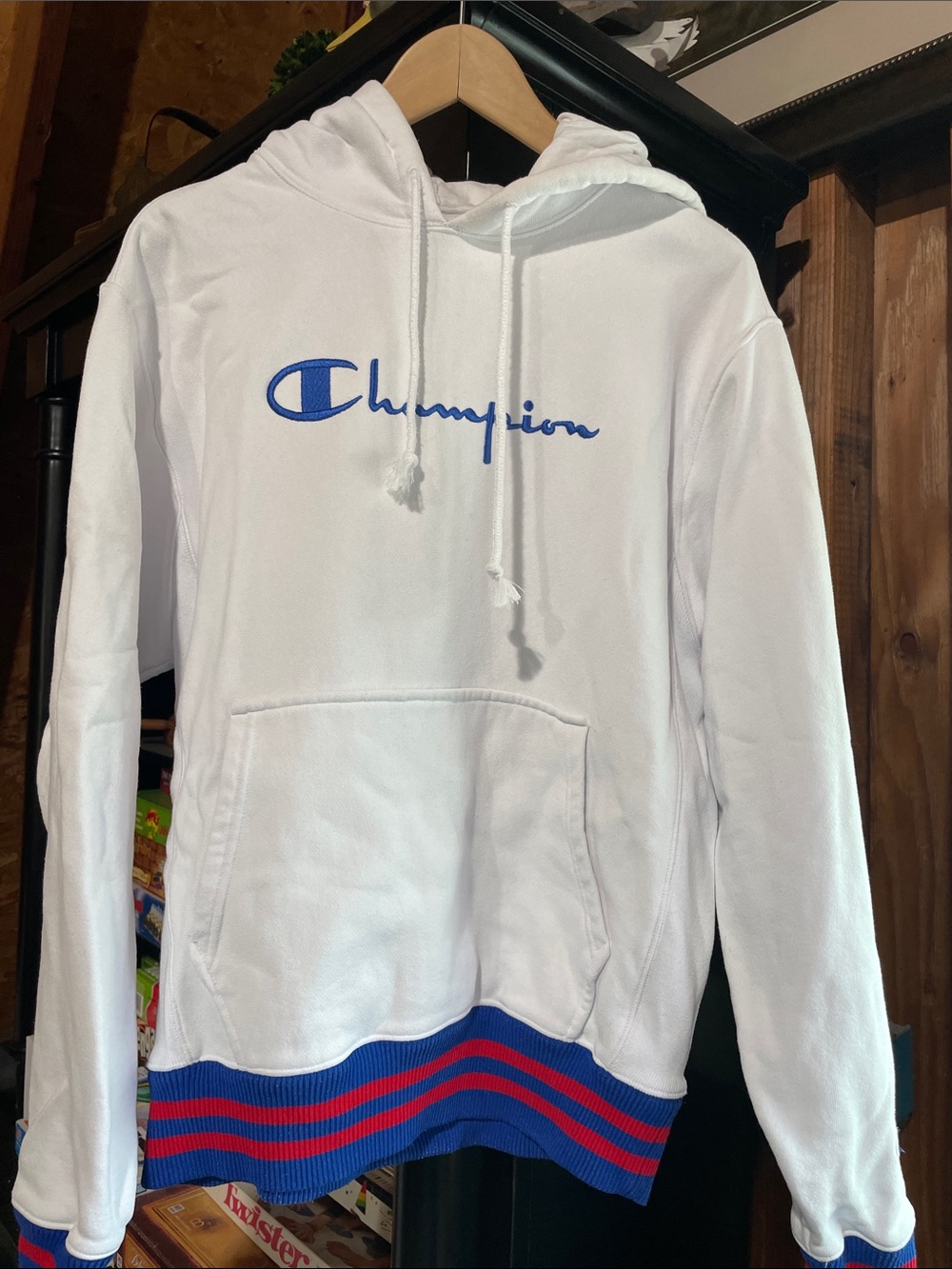 Champion White Hoodie with Blue Logo and Blue & Red Striped Hem